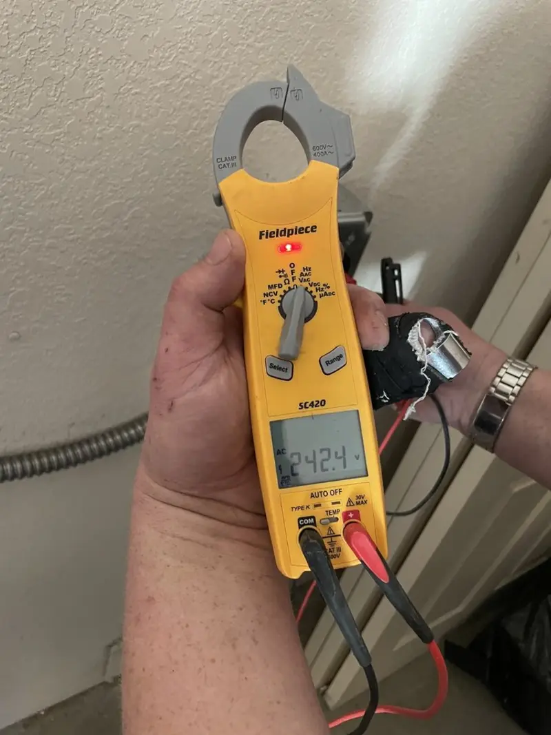 Voltage testing with clamp meter during Generator Installation in Potomac Mills